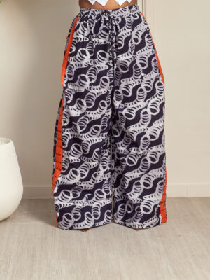 SASHES X HIDES ORANGE JAWU ON SIDE ADIRE FLARE PANTS