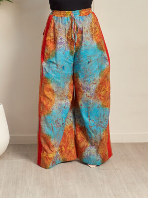 SASHES X HIDES RED JAWU ON SIDE ADIRE FLARE PANTS