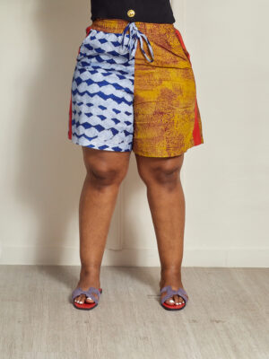 SASHES X HIDES TIARA MIXED PRINT ADIRE WITH RED ASOOKE ON SIDES SHORTS