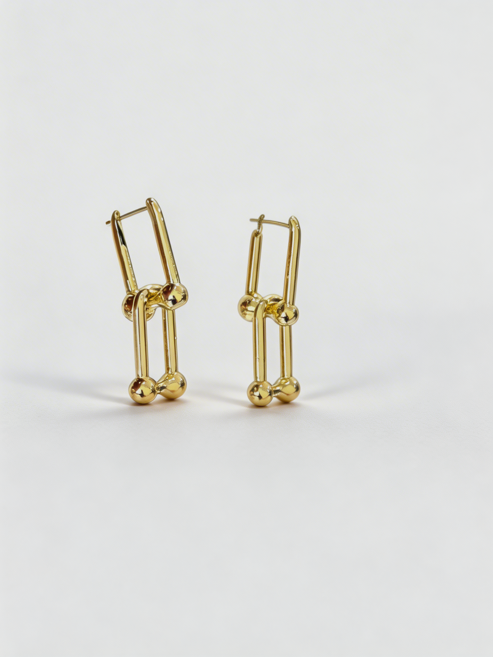 UM GOLD DOUBLE LOCK EARRING